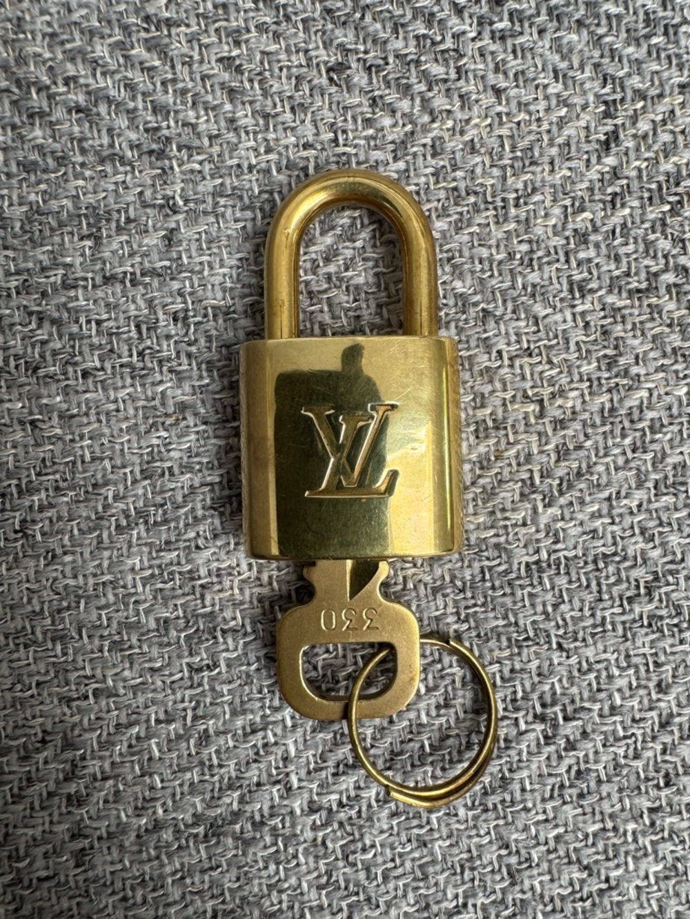#330 Louis Vuitton Gold-Tone LV Padlock Key Charm​